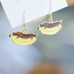 Load image into Gallery viewer, Little Oh - Dropped Earrings (Dachshund on Banana)
